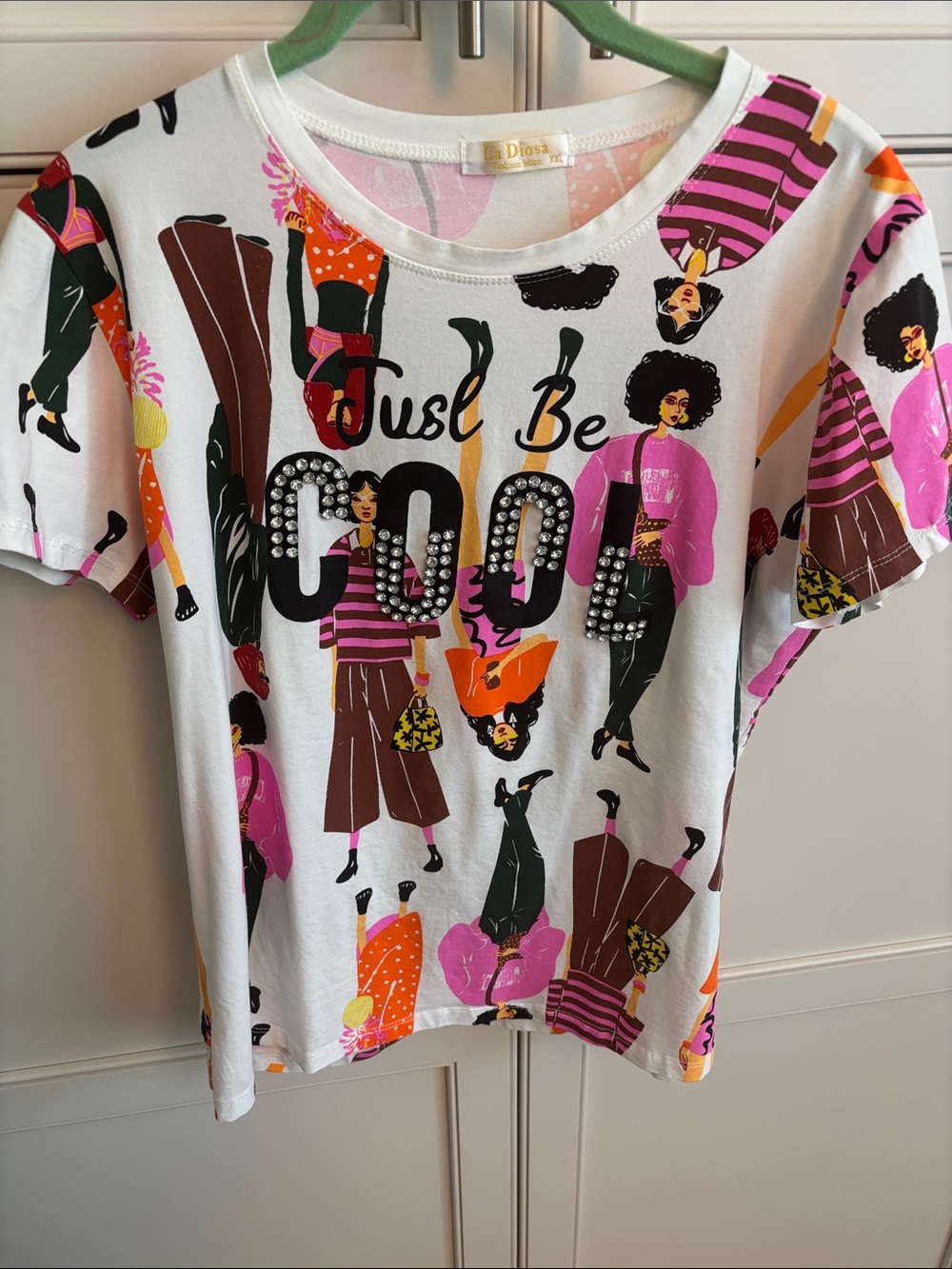 Just Be Cool Women's White Graphic Tee with Pink & Orange Accents